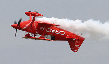 Plane flying upside down.